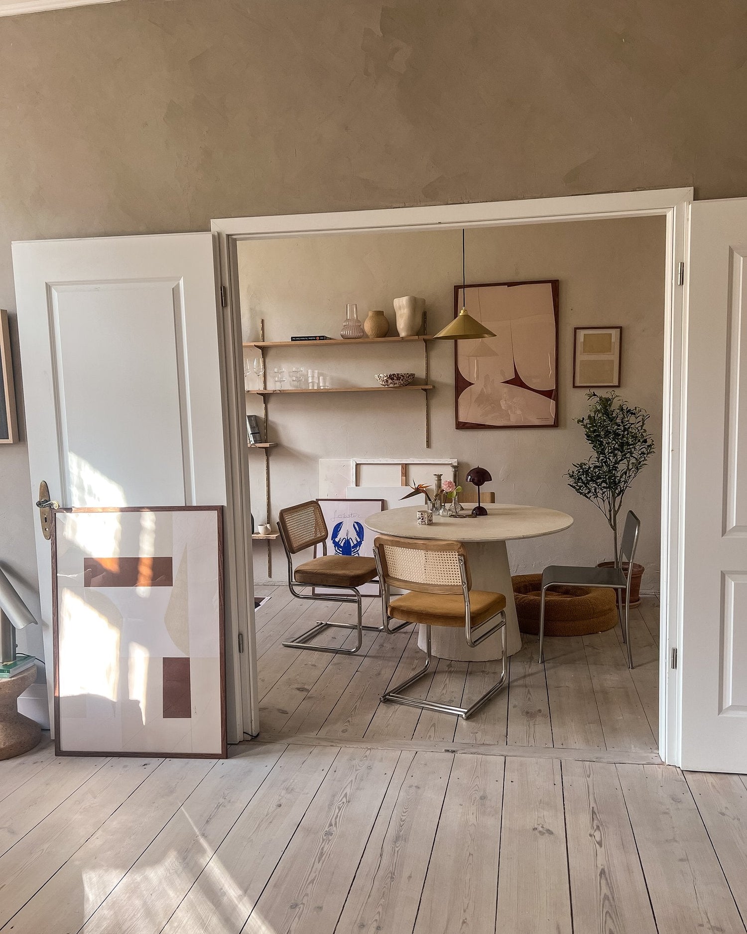 Curated poster wall with a minimalist look